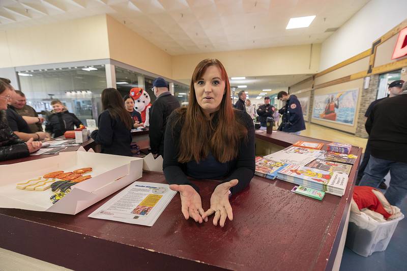 Becca Mayberry talks about the family tragedy that pushed her to create a fire safety event Saturday, Jan. 11, 2025, at the Northland Mall in Sterling. Nine members of Becca’s family were killed in a fire on Jan. 13, 2016 in Rock Falls.