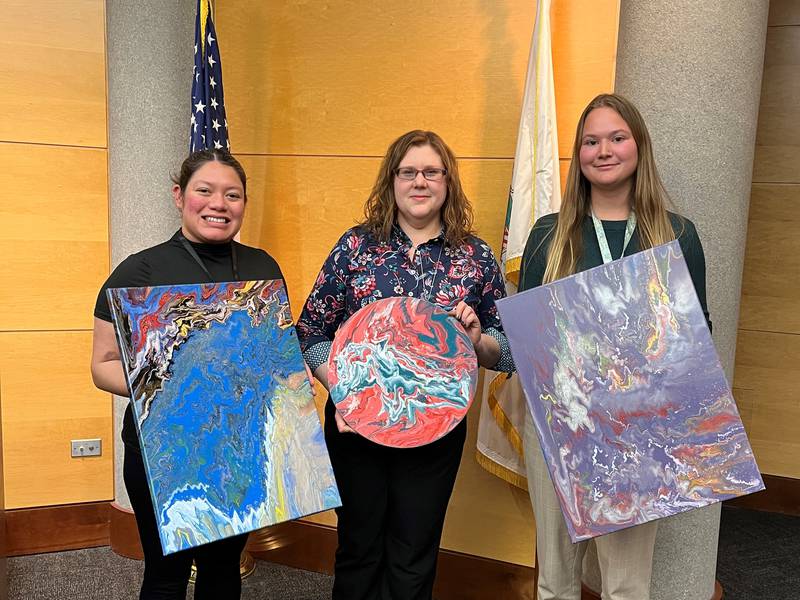 Kane County Court staff and specialty court participants created pour paintings to decorate the newly renovated Family Order of Protection Division.