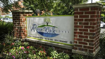 Joliet police officer almost struck by scissors at Riverwalk Homes, other officers finds gun