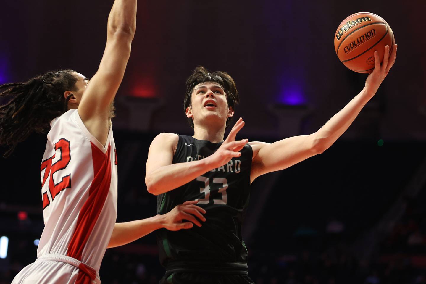 Glenbard West’s Bobby Durkin lays in a shot against Bolingbrook in the Class 4A semifinal at State Farm Center in Champaign. Friday, Mar. 11, 2022, in Champaign.