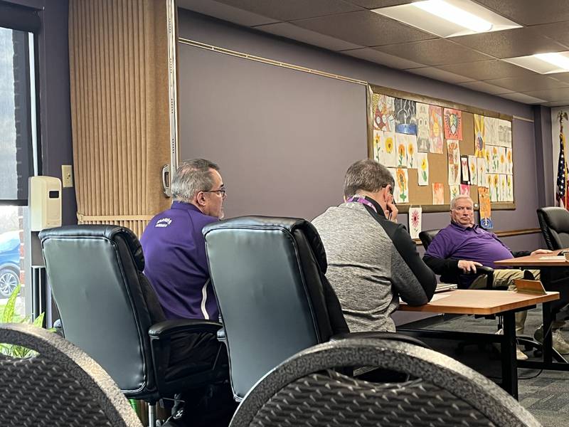Dixon USD #170 Business Manager Marc Campbell (left) explains to the board at its April 16 meeting why he would not recommend the district adopt a federally assisted program that provides free meals to all students.
