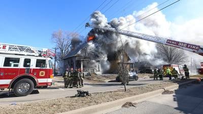 Photos: La Salle firefighters battle two-story house fire on Bucklin Street