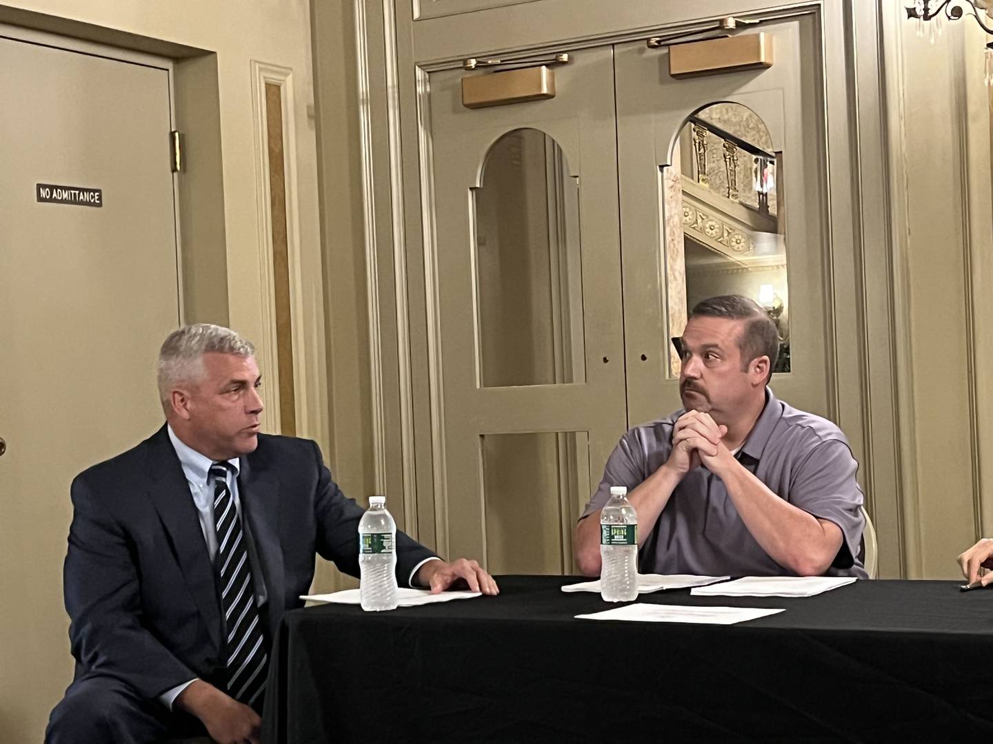 Joliet Mayor Robert O'Dekirk (left) speaks with the Rialto Square Theatre board on Wednesday, Aug. 24, 2022. Pictured next to O'Dekirk is board member William Kent.