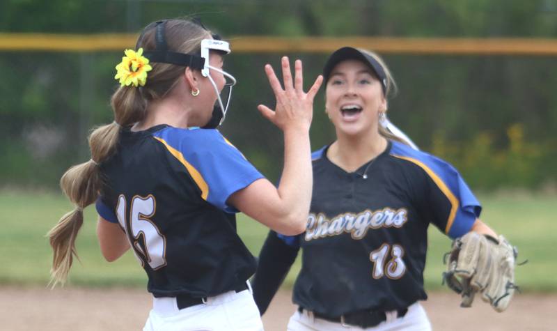 Aurora Central Catholic’s Corina Maratea, left, and Morgan Vaghy, right celebrate as the Chargers win 4-3 over Marengo in varsity girls softball IHSA Class 2A Regional Title Game action on Friday, May 22, 2026 at Raymond Benoy Field on the campus of Marian Central High School in Woodstock.