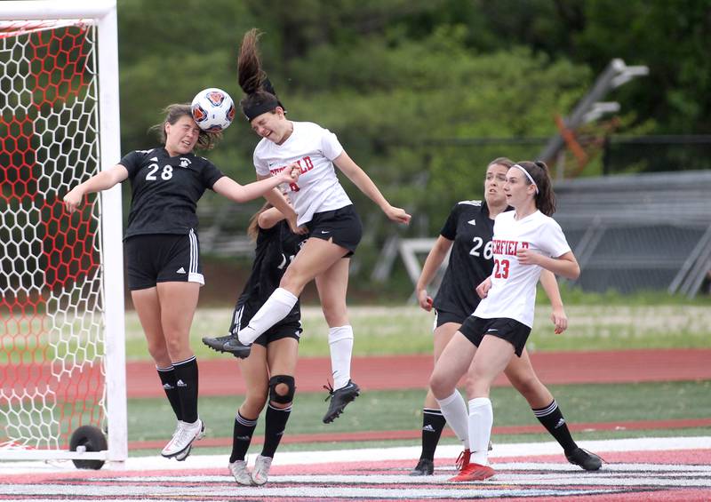 Fenwick’s Grace Kapsch (28) and Deerfield's Emily Fox (8) head the ball during their IHSA Class 2A State consolation game at North Central College in Naperville on Saturday, June 4, 2022.