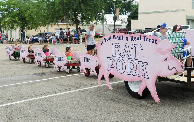 Nelson Farms, located north of Mt. Morris on West Grove Road, brought back its iconic "Pork and Piglets" float for this year's Let Freedom Ring Grand Parade in Mt. Morris on July 4. The mama pig leads with a sign saying "If You Want a Real Treat Eat Pork" with the piglets adding "The Other White Meat - Nelson Farms."