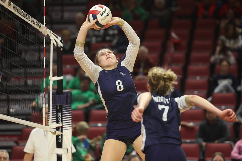 IC Catholic’s Lucy Russ sets the ball against Mater Dei in the Class 2A Volleyball Championship match on Saturday, Nov. 11, 2023 in Normal.