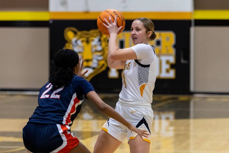 Joliet West's Maya Zanzola looks for an open teammate during a varsity girls basketball game against Romeoville at Joliet West on Dec. 11, 2025.