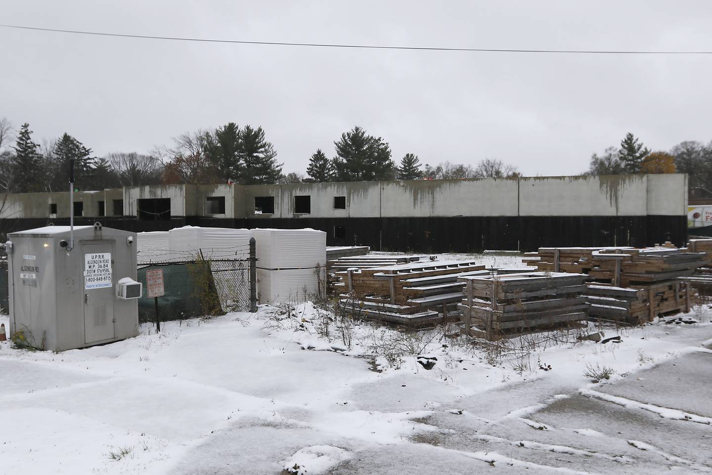 The Grove Residences on Thursday, Nov. 21, 2024, in Fox River Grove. The Village of Fox River Grove plans to put up a new fence around abandoned unfinished apartment complex over safety and resident concerns after the old fence was removed.