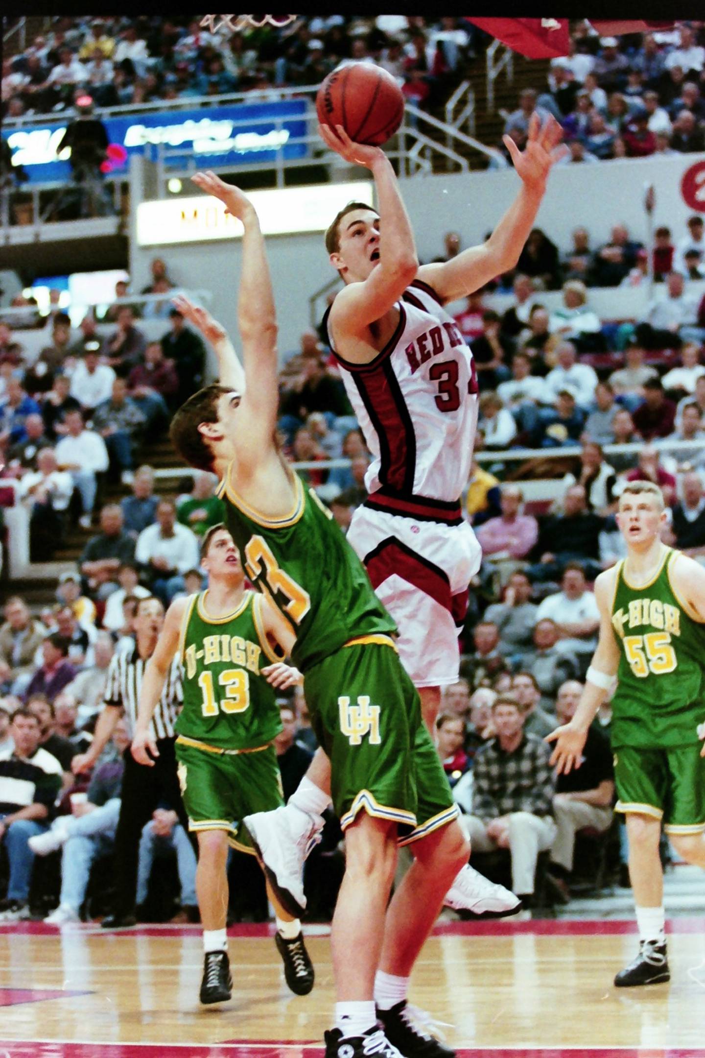 Hall junior Joey Reed powers up for a shot during the 1996-97 state semifinals against Normal U-High.