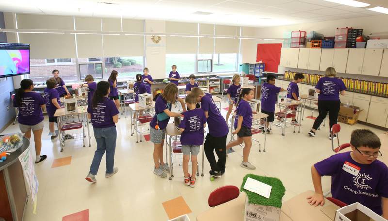 Students work on claw machine projects during Inventor Camp on Friday, June 13, 2025 at Central Intermediate School in Ottawa.