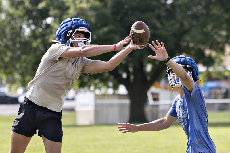 Newman players Rylan Alvarado (left) and Ayden Gutierrez work on secondary drills Tuesday, August 12, 2025, at the high school. The team is gearing up for the 2025 season.