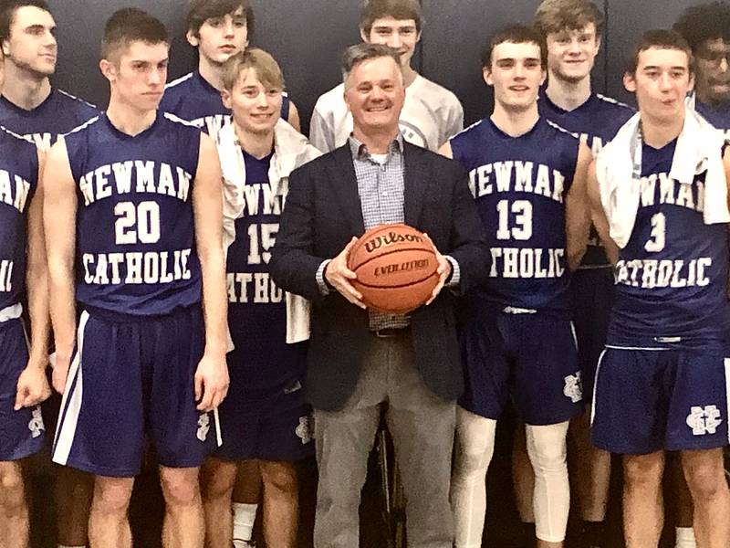 Newman held on to beat Bureau Valley 64-62 Wednesday night at the Storm Cellar to hand coach Ray Sharp his 300th career victory.