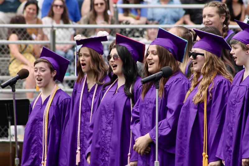 Dixon High School School Concert Choir performs "Home" during the Dixon High School graduation on Sunday, May 28, 2023.