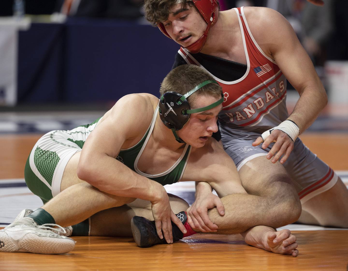 Coal City’s Aidan Kenney works on the leg of Vandalia’s Dillon Hinton in the 1A 157 pound class Saturday, Feb. 21, 2026, at the IHSA wrestling finals in Champaign.