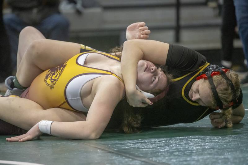 Bailey Herr of Putnam County defeats Patience Riggs to secure her entry into the  IHSA girls wrestling state championship during sectionals at Geneseo High School on February 10, 2024.