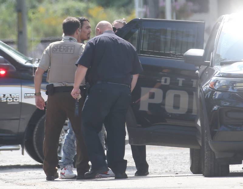 Ottawa Police and La Salle County Sheriff deputies make an arrest in the 1500 block of Scott Street just south of U.S. 6 on Wednesday, Sept, 13, 2023 in Ottawa. A suspect had nearly an hour standoff with police around noon and was taken into custody around 1p.m. The suspect was involved in the Tuesday evening shooting near Ottawa’s downtown courthouse and was apprehended following a brief standoff early afternoon Wednesday.