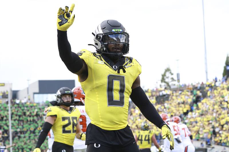 Oregon defensive back Tysheem Johnson reacts to a play during an NCAA college football game against Illinois, Saturday, Oct. 26, 2024, in Eugene, Ore. (AP Photo/Lydia Ely)