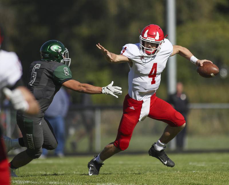 Hinsdale Central’s Michael Brescia fights off Glenbard West’s Brandon Nowinski in Glen Ellyn Oct. 19 2019.