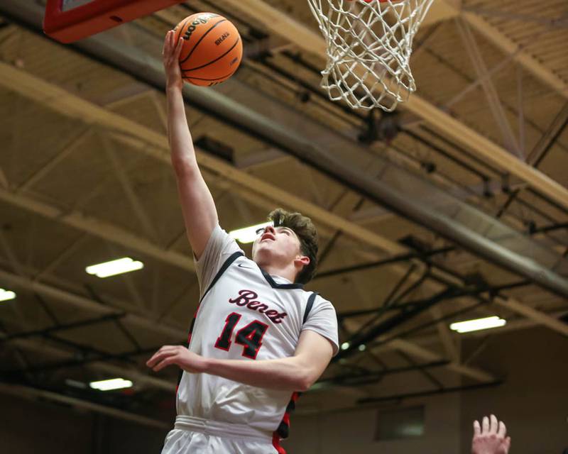 Benet's Aidan Renicker (14) puts in a layup during their Class 4A Bolingbrook Sectional semifinal basketball game between Yorkville at Benet, March 3, 2026 in Bolingbrook.