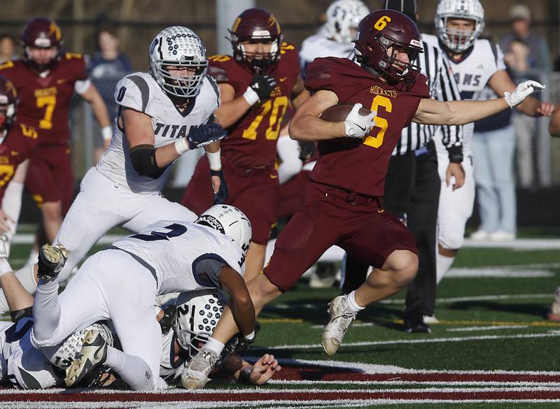 Richmond-Burton's Hunter Carley runs with the ball during during an IHSA Class 3A quarterfinal playoff football game against Monmouth-Roseville on Saturday, November 15, 2025, at Richmond-Burton High School, in Richmond.