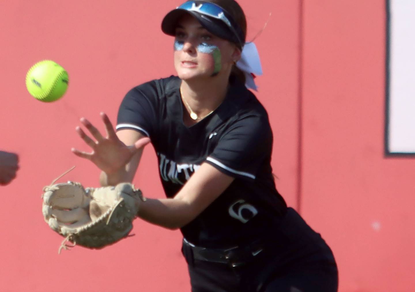 Huntley’s Ava McFadden lunges to catch a fly ball for an out against Barrington in IHSA Class 4A Sectional Title Game softball action at the Fields of Dreams on the campus of Barrington High School in Barrington on Friday, June 6, 2025.