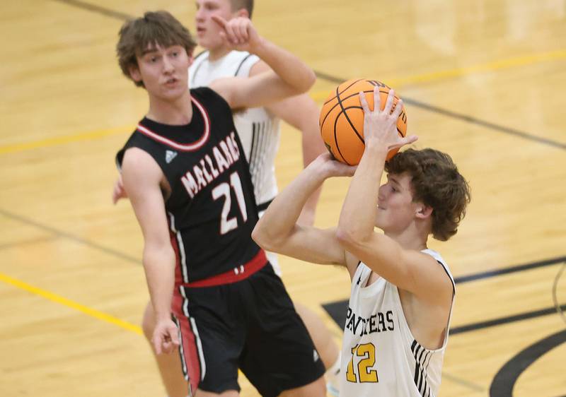 Putnam County's Brayden Zuniga shoots a jump shot over Henry-Senachwine's Carson Rowe on Friday, Dec. 5, 2025 at Putnam County High School.