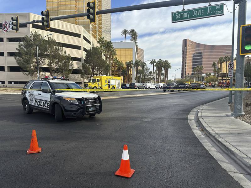 Police block the area after a vehicle caught fire and exploded outside the lobby of President-elect Donald Trump's hotel Wednesday, Jan. 1, 2025.   (AP Photo/Ty ONeil)