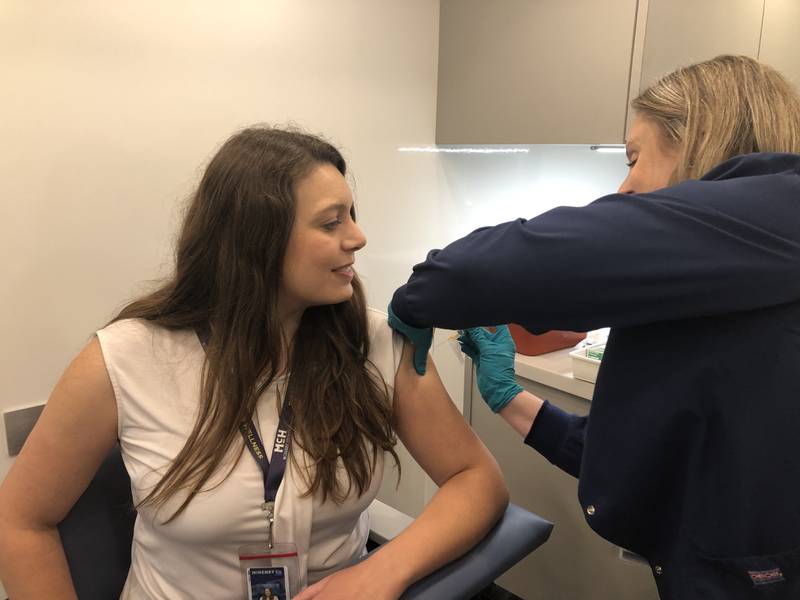 Alicia Schueller receives a shot at the McHenry County mobile clinic Oct. 10, 2024.