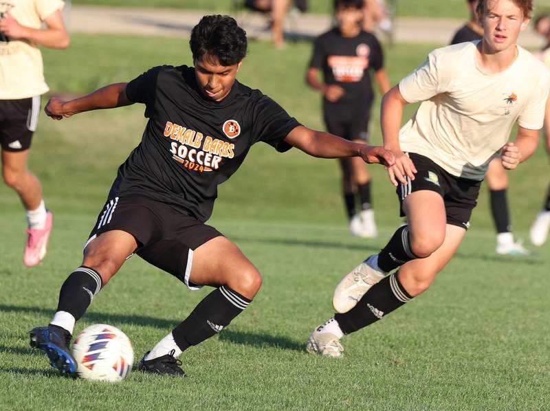 DeKalb’s Henry Garcia controls the ball in Sycamore territory Wednesday, July 17, 2024, during their scrimmage game at Sycamore High School.