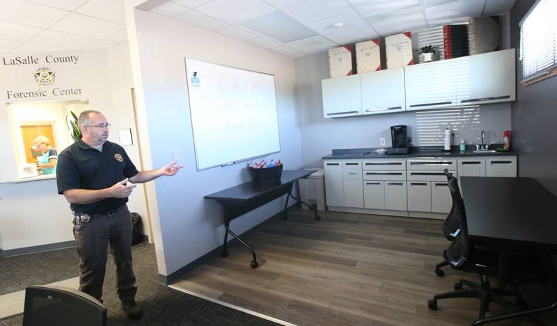 La Salle County Corner Rich Ploch gives a tour of the new at the La Salle County Forensic Center on Wednesday, Aug. 30, 2023 in Oglesby. Among the new features is private meeting space for grieving families. Ploch now has comfortable seating and refreshments to offer the bereaved in meetings that can sometimes last hours.