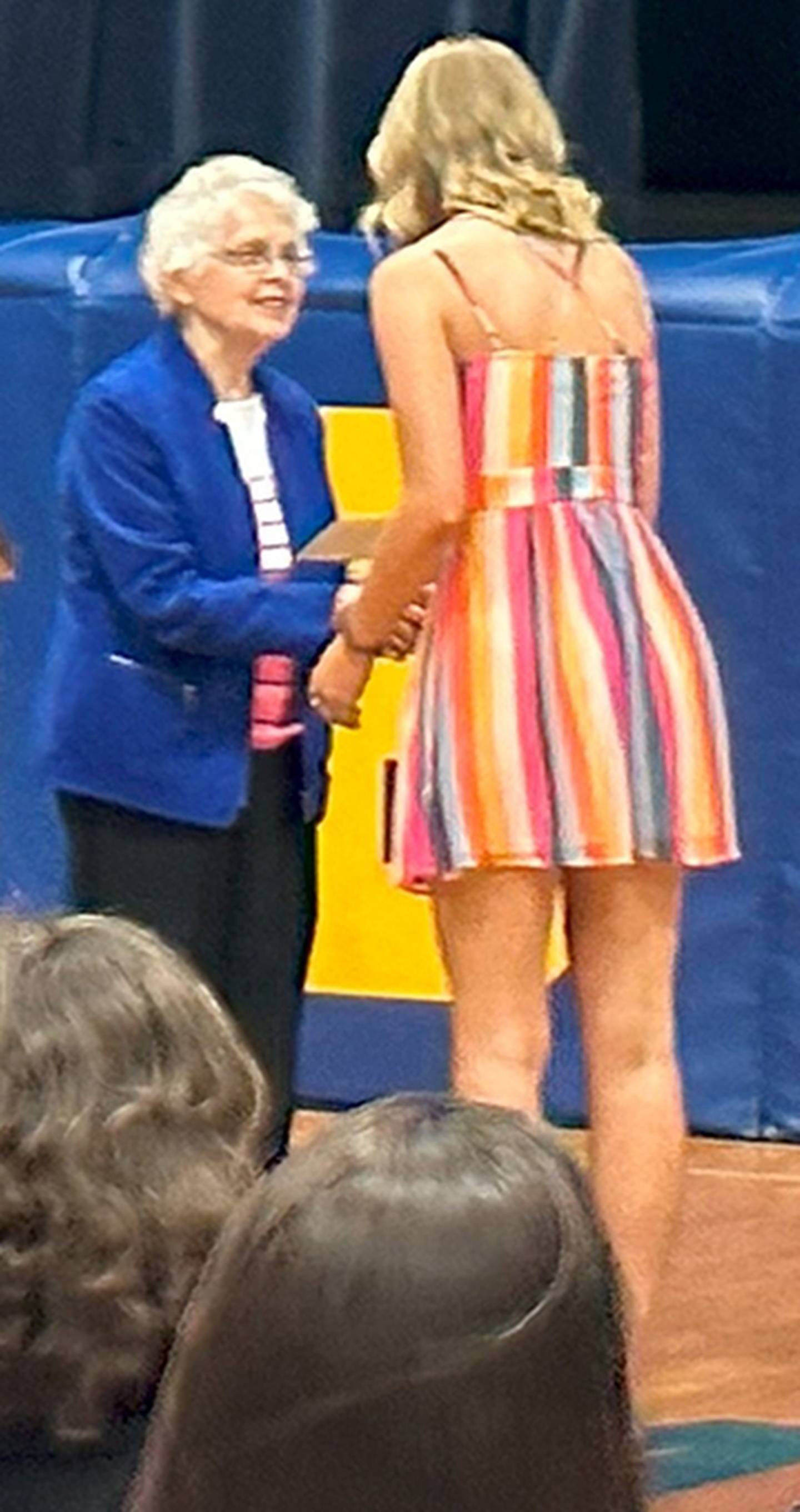 (Left to right); Bobcat Scholarship fund creator Myrtie Warren presenting the award to Somonauk High School graduate Brianna Gibson