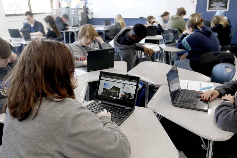 English teacher Dane Erbach teaches about media literacy Tuesday Nov. 22, 2022, during a class at McHenry High School's freshman campus, 1012 N. Green St. in McHenry. The students are using a method where they determine the currency, relevance, authority, accuracy, and purpose of a story.