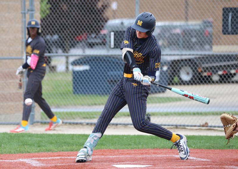 Neuqua Valley's Emmitt Briner takes a cut Tuesday, May 5, 2026, during their game at DeKalb High School.