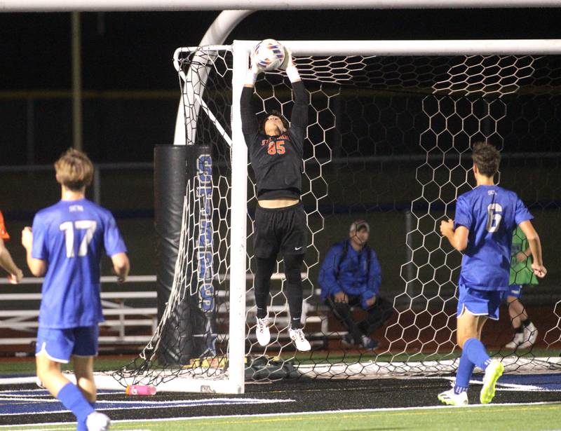 St. Charles East goal keeper Jordan Rolon catches the ball during a Tri-Cities Night game against St. Charles North at St. Charles North on Thursday, Sept. 21, 2023.