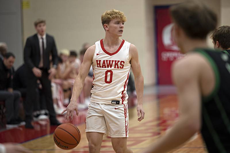 Oregon’s Cooper Johnson handles the ball against Rock Falls Tuesday, Dec. 12, 2023 in Oregon.