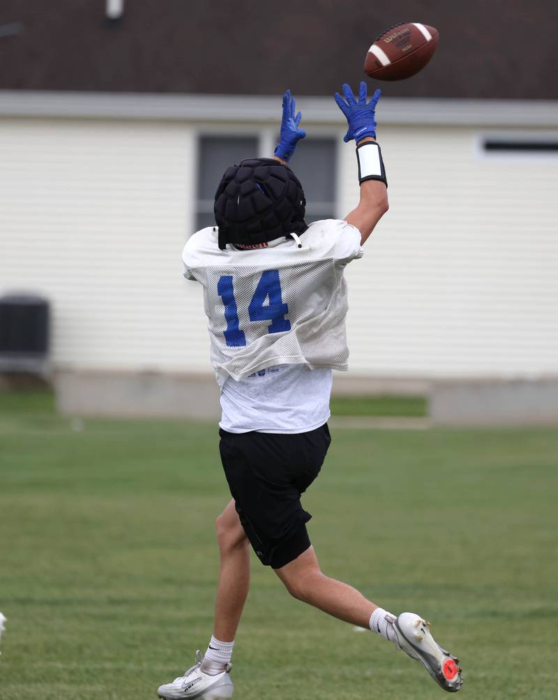 Genoa-Kingston’s Ben Kleba makes a catch Tuesday, Aug. 19, 2025, during practice at the school.