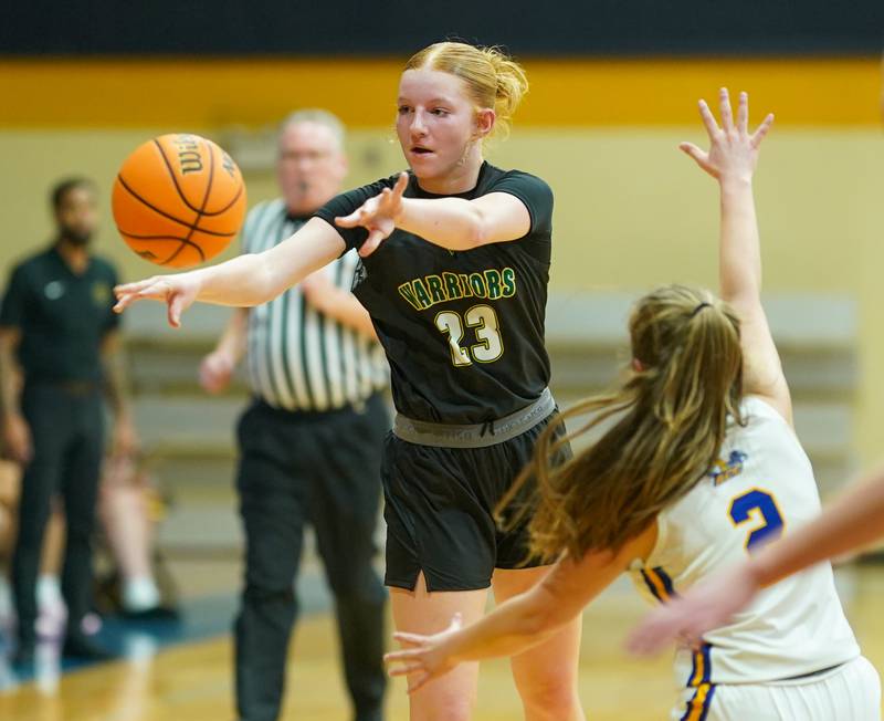 Waubonsie Valley's Lily Newton (23) passes the ball during a basketball game against Aurora Central Catholic at Aurora Central Catholic High School on Thursday, January 30, 2025.