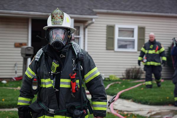 Two people rescued from house fire in Woodstock