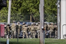 Texas National Guard troops now protecting federal property in Chicago area, official says