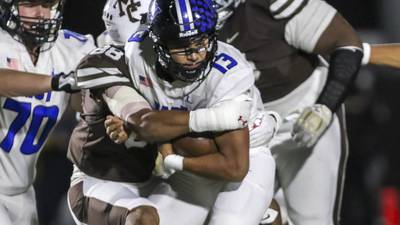 Photos: Lincoln-Way East, Mount Carmel football meet in playoffs