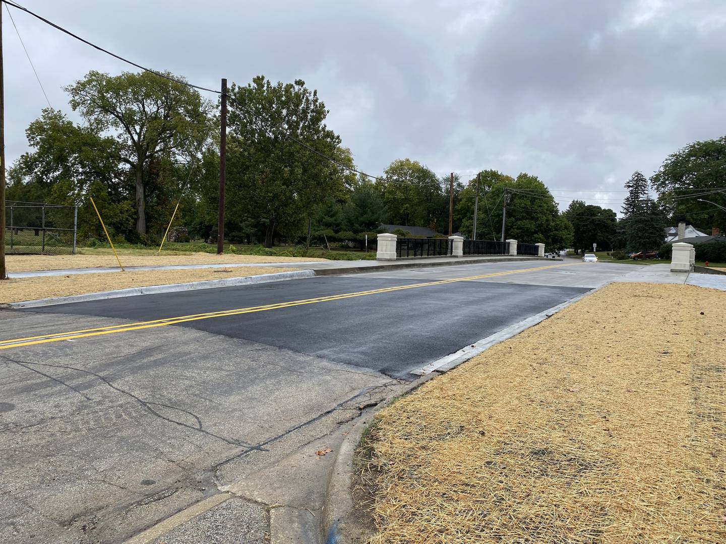 Reconstruction of the Lucinda Avenue bridge near Northern Illinois University campus in DeKalb is complete, shown here on a rainy Sunday afternoon, Sept. 22, 2024. The traffic detour also has been lifted after almost a year's delay due to what city officials said were utility complications.