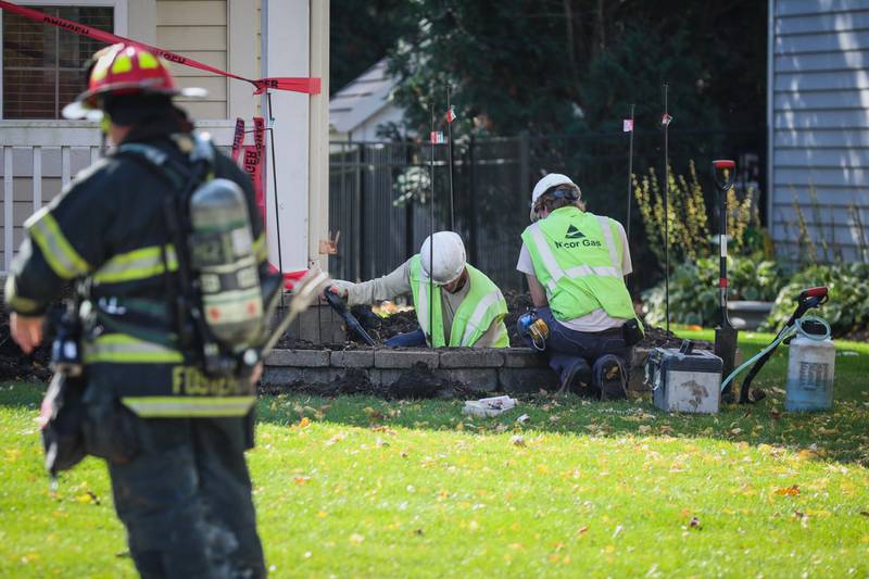 Nicor and Cary fire department officials repair a gas leak in Cary on Oct. 24, 2023.