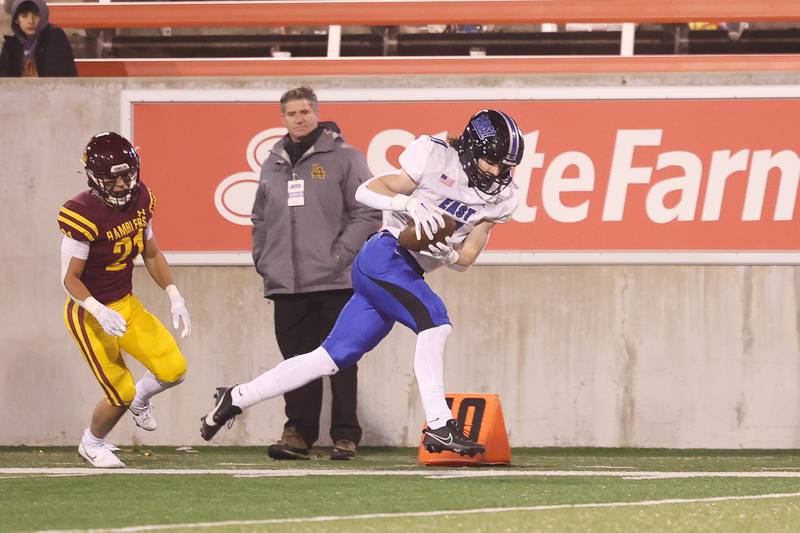 Lincoln-Way East’s Ryan Usher skirts the sidelines after a catch against Loyola in the Class 8A championship on Saturday, Nov. 25, 2023 at Hancock Stadium in Normal.