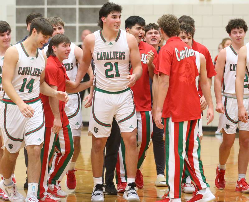 L-P's Josh Senica smiles while walking off the court after scoring 1000 points in his high school career against Hall on Tuesday, Nov., 28, 2023 in AJ Sellett Gymnasium at L-P High School.