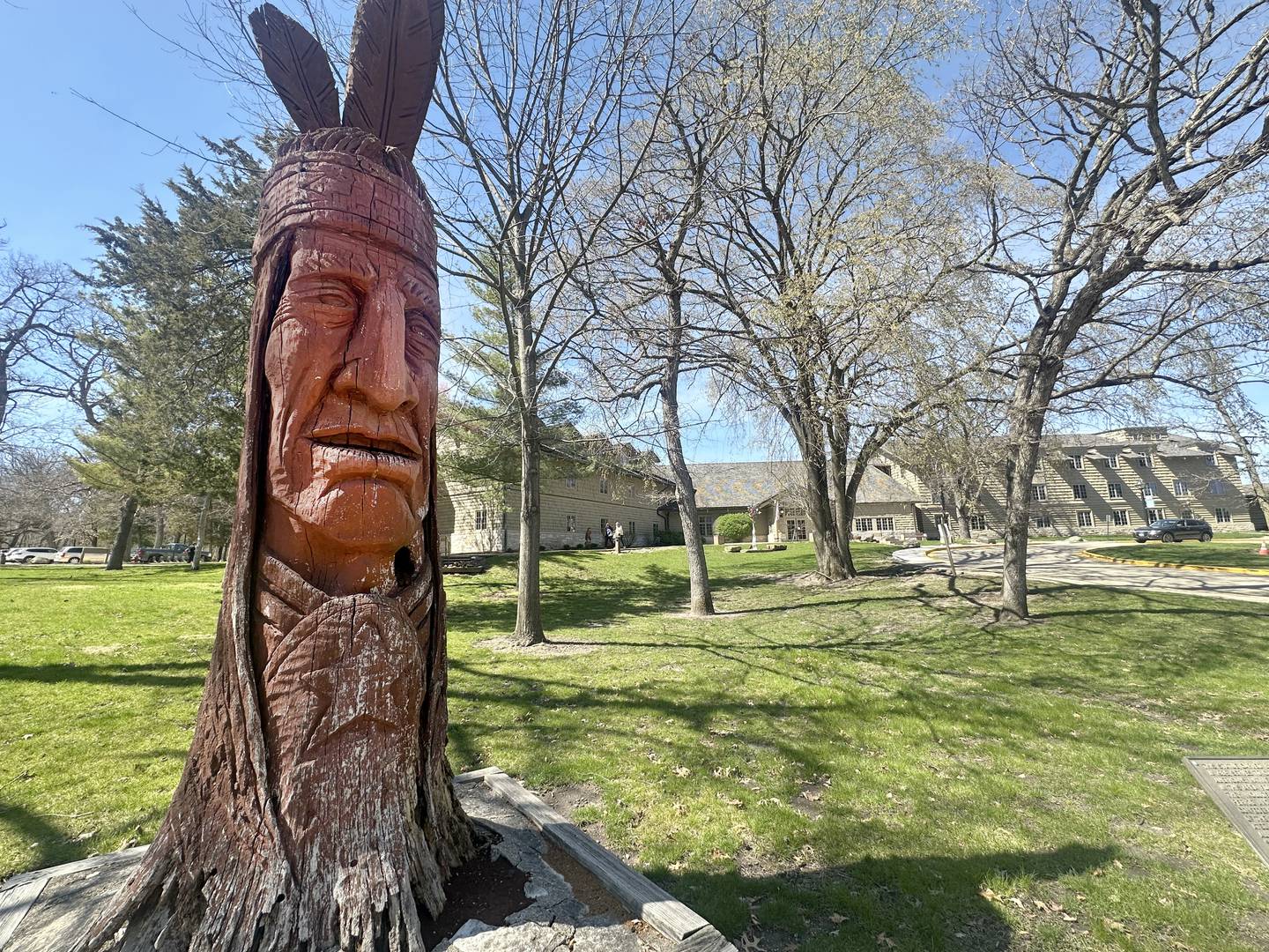 This statue carved by Peter "Wolf" Toth in 1989 serves as a memory to Native Americans that have lived in the Starved Rock area for over 10,000 years on Tuesday, April 9, 2024 at Starved Rock Lodge. The IDNR recently issued a statement acknowledging that park names could be reconsidered, including renaming Starved Rock.