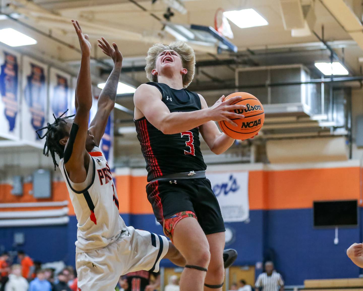 Yorkville's Frankie Pavlik (3) goes up for a layup during their basketball game between Yorkville at Oswego, Tuesday Dec 10, 2024 in Oswego.