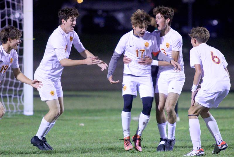 Richmond-Burton’s Joe Kyes and the Rockets celebrates after he scored on a bicycle-kick shot in varsity soccer on Monday, Oct. 7, 2024, at Dan Horne Field on the campus of Harvard High School in Harvard.