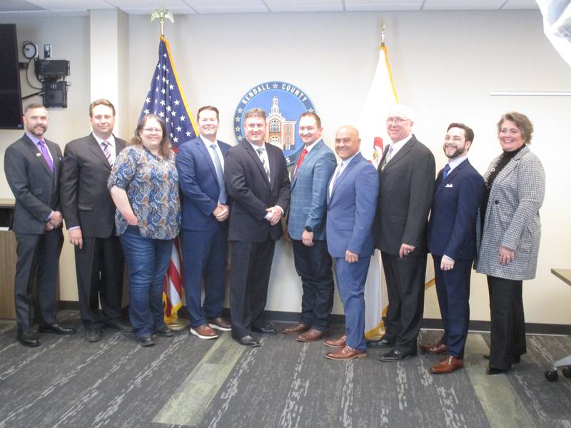 The new Kendall County Board was sworn into office on Dec. 5, 2022. They are, from left, Jason Peterson, Dan Koukol, Elizabeth Flowers, Scott Gengler, Matt Kellogg, Seth Wormley, Ruben Rodriguez, Brian DeBolt, Zach Bachmann and Brooke Shanley.