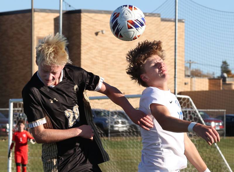 Sycamore's Paxton Nicol (left) and Burlington Central's Samuel Knych go up for a header  Wednesday, Oct. 23, 2024, during their Class 2A Sycamore Regional semifinal.